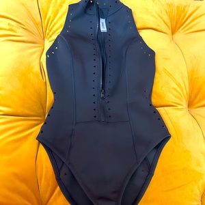 Mathilda One Piece, durable and can’t see through. Zipper is sturdy, easy open.
